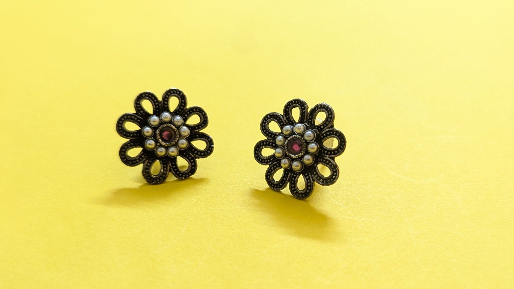 Flower Shape Silver Oxidized Stud Earring With Pearls & Red Stone In Center