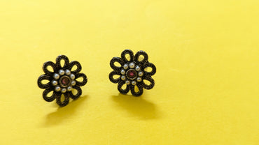 Flower Shape Silver Oxidized Stud Earring With Pearls & Red Stone In Center