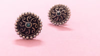 Round Pearl Studded Silver Oxidized Stud Earring With Green Stone In Center